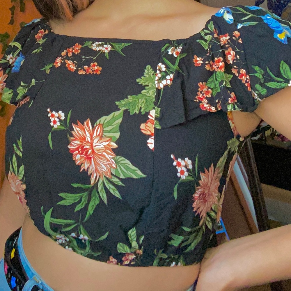 black floral off the shoulder shirt